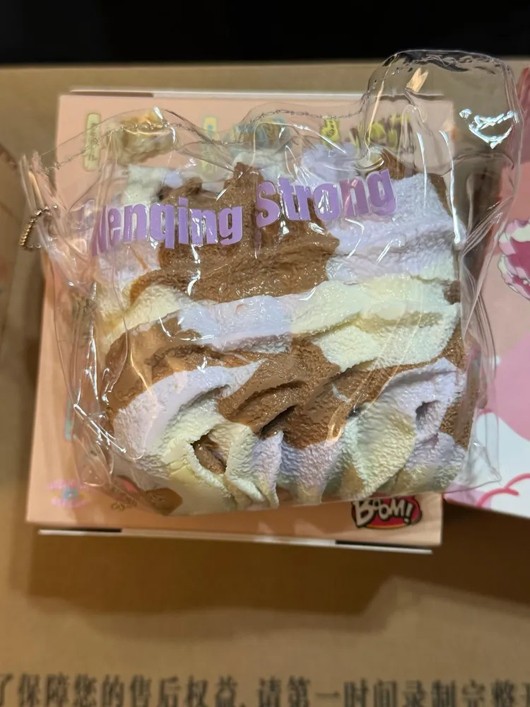 WenQing Strong Purple Truffle Cream Roll Taba Squishy